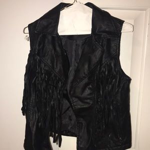 black vest with fringe